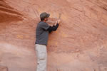 Greg White measuring a handprint in Canyon de Chelly, Arizona. We were attempting to use hand measurements to differentiate male from female hands.